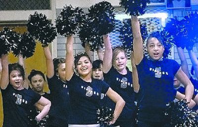 
The Shaw Middle School Spirit Squad performs a cheer during a school assembly.  
 (Holly Pickett / The Spokesman-Review)