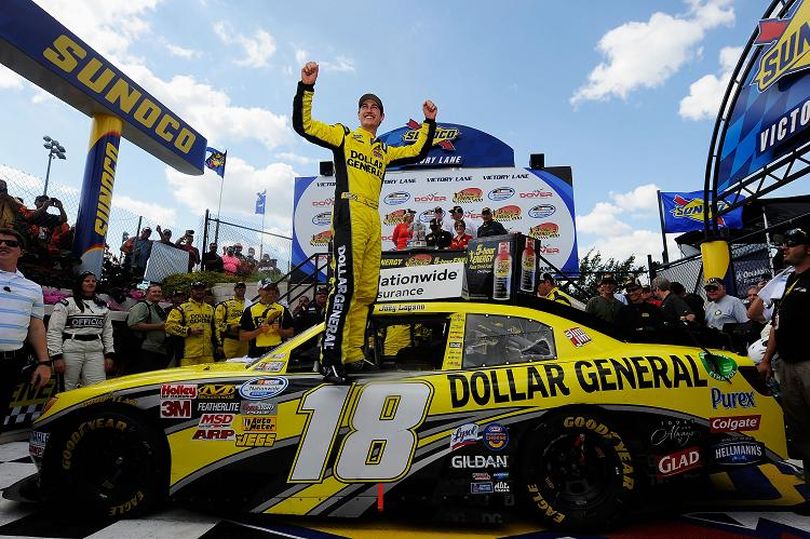 Joey Logano, driver of the #18 Dollar General Toyota, celebrates in Victory Lane after winning the NASCAR Nationwide Series 5-hour Energy 200 at Dover International Speedway on June 2, 2012 in Dover, Delaware. (Photo by Patrick McDermott/Getty Images for NASCAR) (Patrick Mcdermott / Getty Images North America)