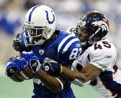 
Colts receiver Reggie Wayne had a huge day.
 (Associated Press / The Spokesman-Review)