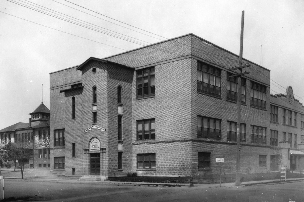 1924: The Hillyard High School campus consisted of the original 1907 building, far left; the 1912 annex, far right; and the 1922 addition, center, which had the school’s first gymnasium and auditorium. (Libby Collection/Eastern Washington Historical Society)