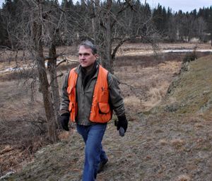 Christopher DeForest, Inland Northwest Land Trust executive director, surveys private property along Hangman Creek. The non-profit organization helped the Ralph Hein family preserve the land with a conservation easement.   (Rich Landers)
