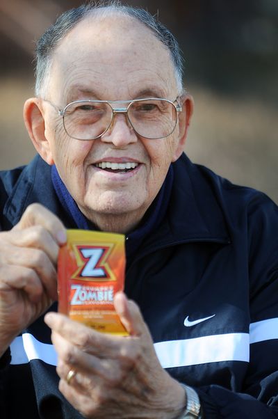 Don “Grumpa” Andersen, who owned Grumpa’s Eatin’ Barn in Kalispell, holds a new packet of Grumpa’s Zombie Flavoring. (Associated Press)