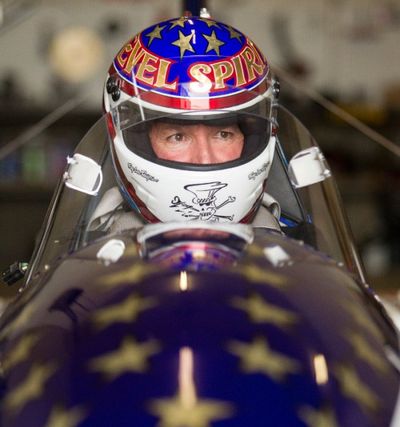 In a Thursday, Sept. 1, 2016 photo, stuntman Eddie Braun gives feedback after getting into the cockpit of The Evel Spirit, a steam powered rocket, at the team's shop in Twin Falls, Idaho. Braun is preparing to attempt to jump the Snake River Canyon in a replica of Evel Knievel's rocket. (Drew Nash/The Times-News via AP)