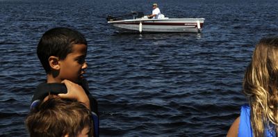 “It’s safer to boat during the week,” said Hardy Buchanan, center, of Hauser Lake after a morning of fishing Wednesday.  Boat traffic  is often heavier on weekends.  (Kathy Plonka / The Spokesman-Review)