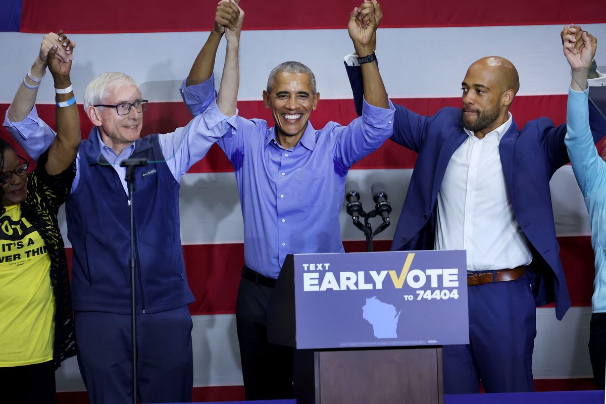 Former U.S. President Barack Obama stumps for Wisconsin Gov. Tony Evers, left, and Democratic candidate for U.S. Senate in Wisconsin, Mandela Barnes, right, on Saturday in Milwaukee.  (Tribune News Service)