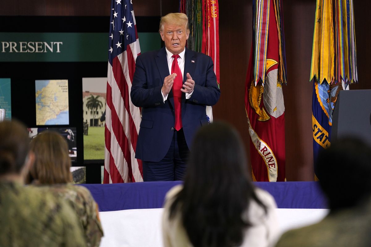President Donald Trump claps after delivering a speech about the counternarcotics operations at U.S. Southern Command, Friday, July 10, 2020, in Doral, Fla. (Evan Vucci)