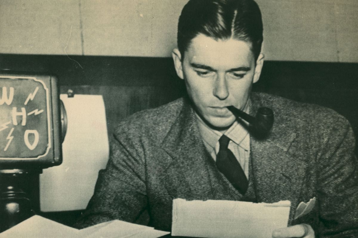 Ronald Reagan is shown working as a sportscaster at radio station WHO in Des Moines, Iowa in the photo dated circa 1933-34.  Reagan worked as an announcer and sportscaster for over five years and it was his sportscasting work that led him to Hollywood in 1937, where he began his movie career. (File / Asociated Press)