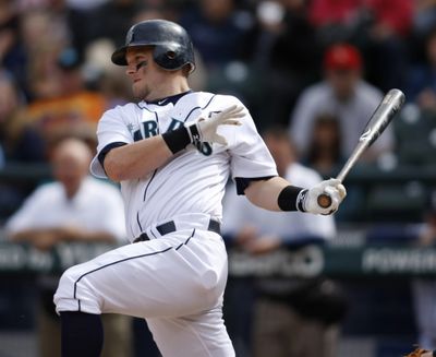Mariners catcher Adam Moore drives in the go-ahead run in the seventh inning. (Associated Press)