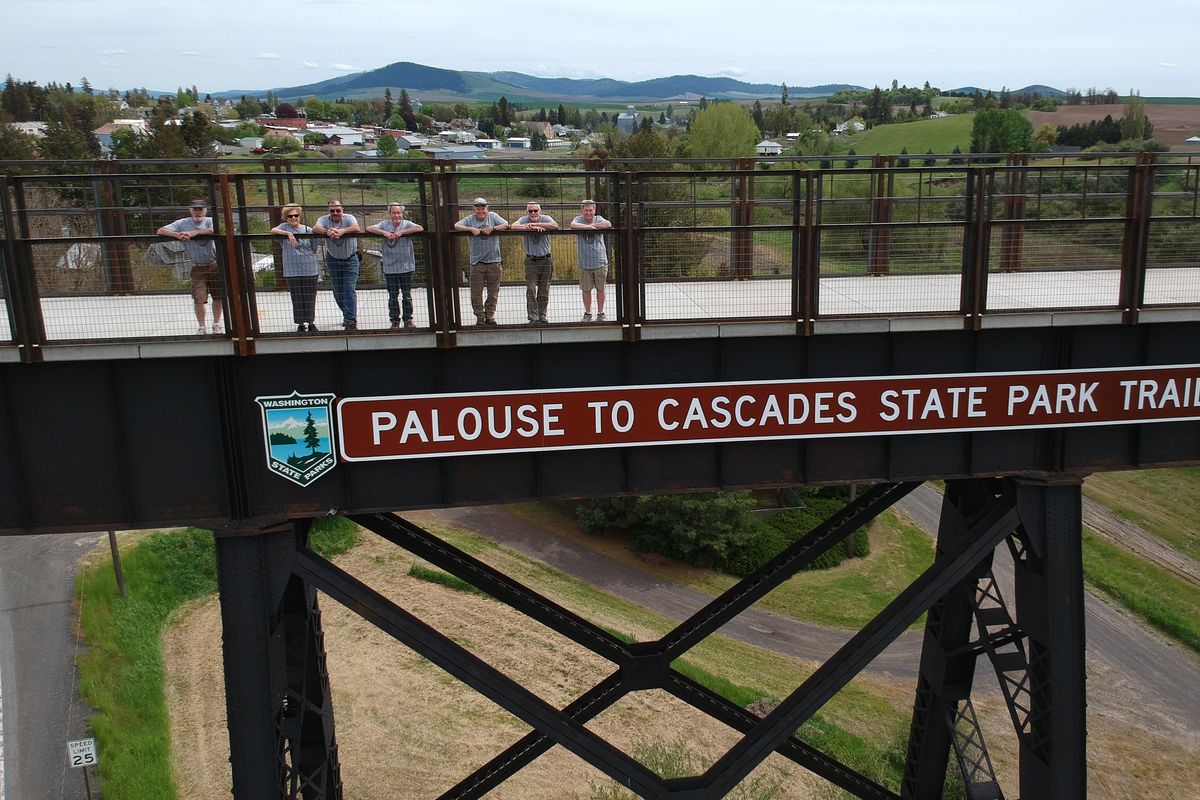 Above: Members of the Friends of the Tekoa Trestle who shepherded the renovation of the old railroad bridge in Tekoa, Wash., into part of the Palouse to Cascades State Park Trail stand on the bridge May 26. They are Hal Whitman, left, Fran Martin, Fred Wagner, Ivan Mercer, Pete Martin, Monte Morgan and Tim St. John.  (Jesse Tinsley/THE SPOKESMAN-REVIEW)