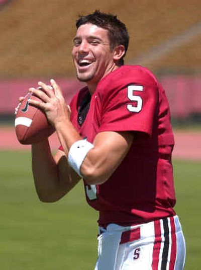 Stanford quarterback Trent Edwards has more to smile about this season after an uneven 2003 showing with the Cardinal.
(Associated Press / The Spokesman-Review)