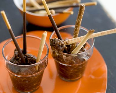 Combine chocolate, peanut butter and graham cracker crumbs to make yummy Pots of Mud. (Associated Press)