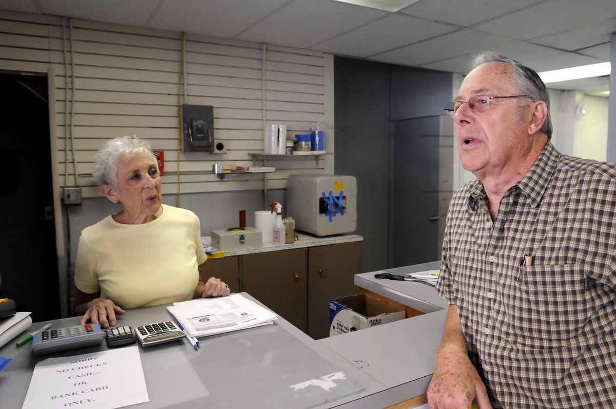 Barbara and Bill Votava talk about the closure of their business, Washington Photo, which they ran in Spokane for more than 50 years.  (Photos by Jesse Tinsley / The Spokesman-Review)