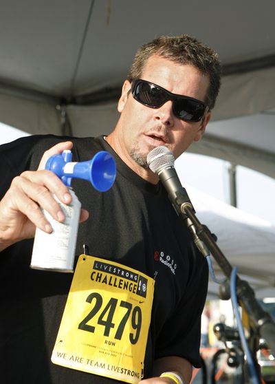 Former Philadelphia Phillies pitcher Mitch Williams sounds the horn for the start of a LIVESTRONG Challenge 5K/10K walk and run in Blue Bell, Pa., Aug. 21, 2010. (Associated Press / Ap Images)