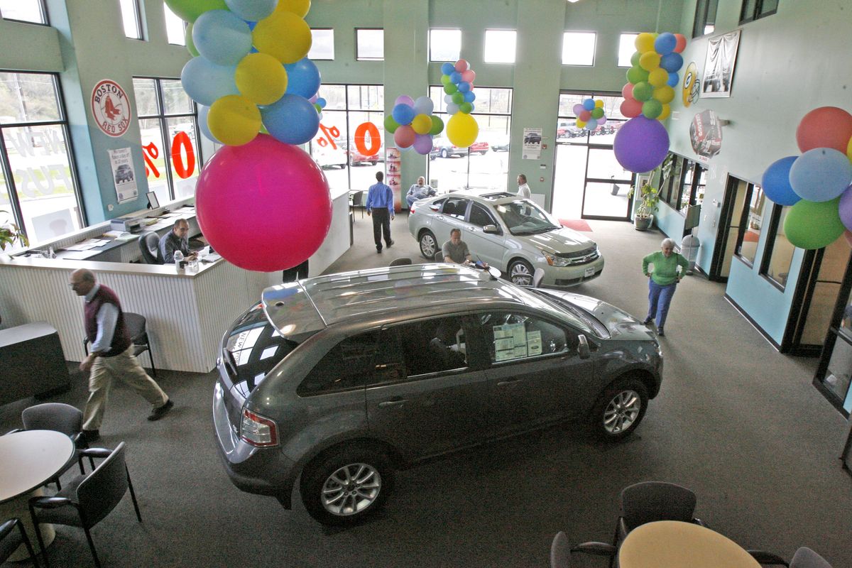Customers visit   a Ford dealership in Montpelier, Vt. Ford’s U.S. sales jumped 37 percent in the first three months of this year. Associated Press photos (Associated Press photos)