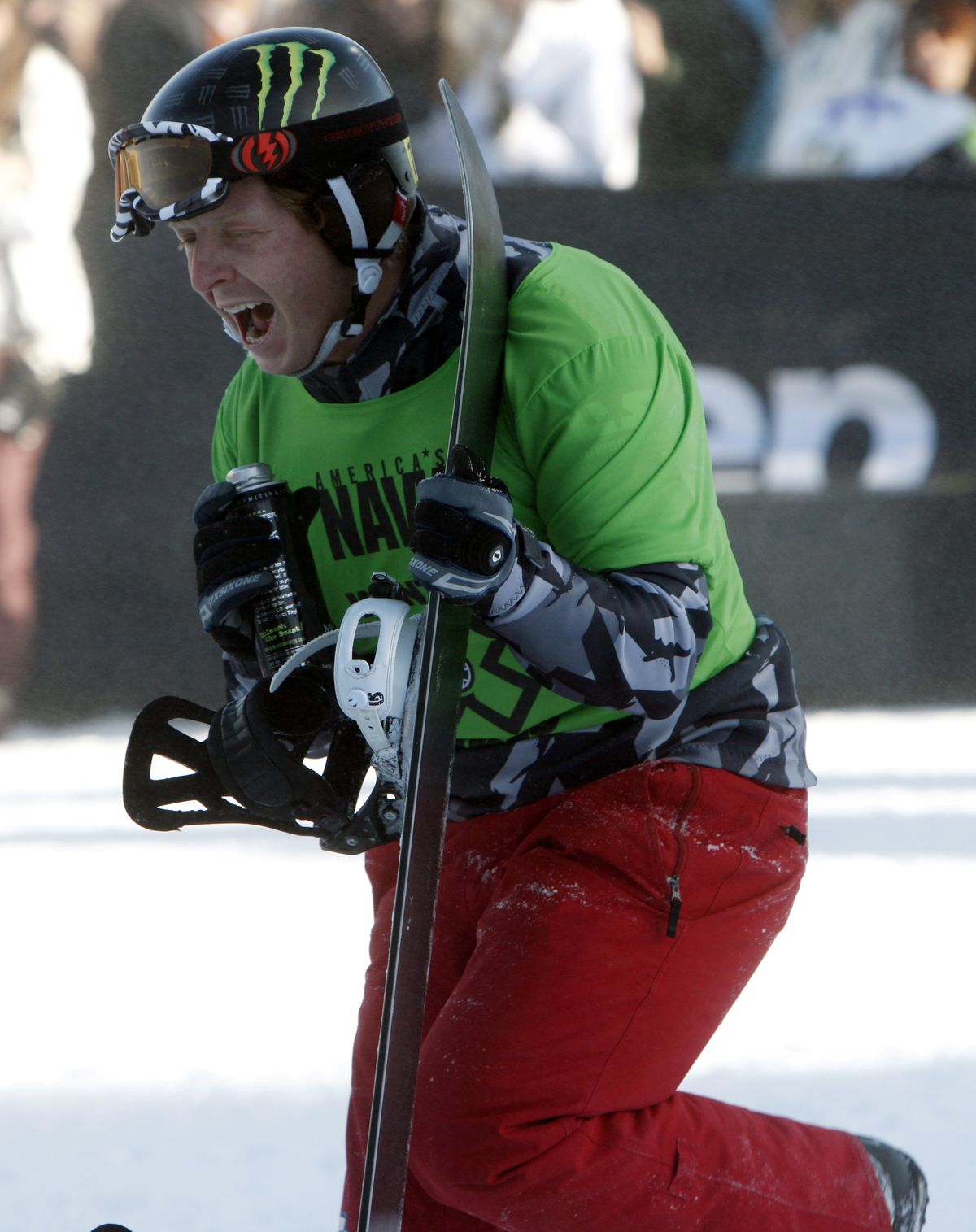Nate Holland celebrates his fifth straight Winter X Games title.  (Associated Press)