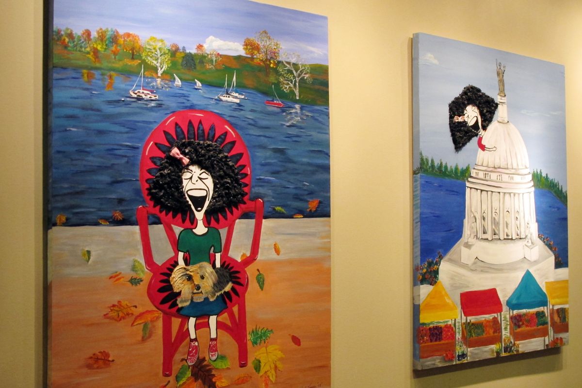 Paintings imagining comedian Gilda Radner in recognizable locations in Madison hang on the wall inside the cancer support group Gilda