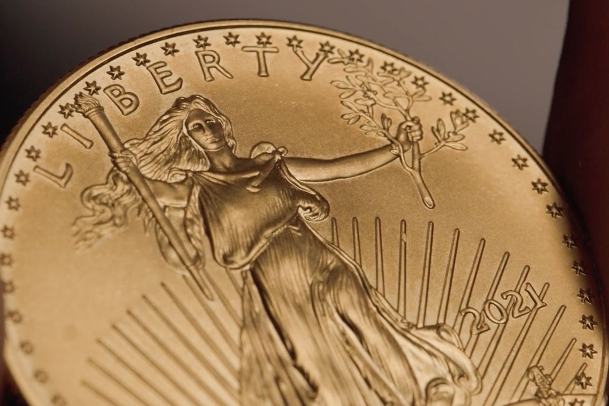 Federal law requires coins like this American Gold Eagle to be minted from only newly mined American gold on Saturday. A New York Times investigation has found the U.S. Mint buys gold that originates in a Colombian drug cartel mine, makes Lady Liberty coins with gold from Mexican and Peruvian pawn shops and from a Congolese mine that is part-owned by the Chinese government, records show.   (New York Times )