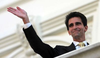 
From a balcony at the Capitol in Sacramento, Calif., Assemblyman Mark Leno waves to supporters of his same-sex marriage bill during a rally on Thursday. 
 (Associated Press / The Spokesman-Review)
