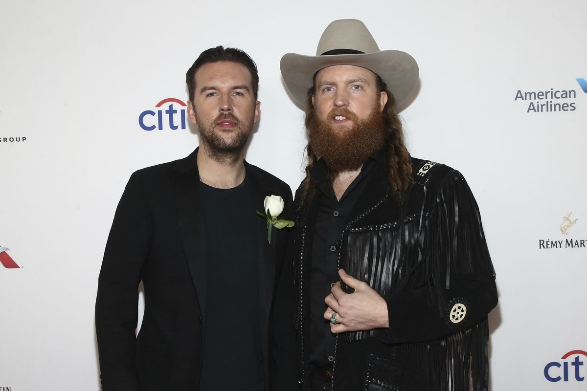 T.J. Osborne (left) and John Osborne of Brothers Osborne attend the Universal Music Group’s 2018 After Party for the Grammy Awards on Jan. 28, 2018 in New York. (John Salangsang / John Salangsang/Invision/AP)
