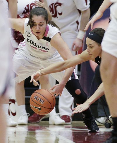Washington State's Pinelopi Pavlopoulou, left, is coming off a career-high 21-point game at Wyoming. (Young Kwak / Associated Press)