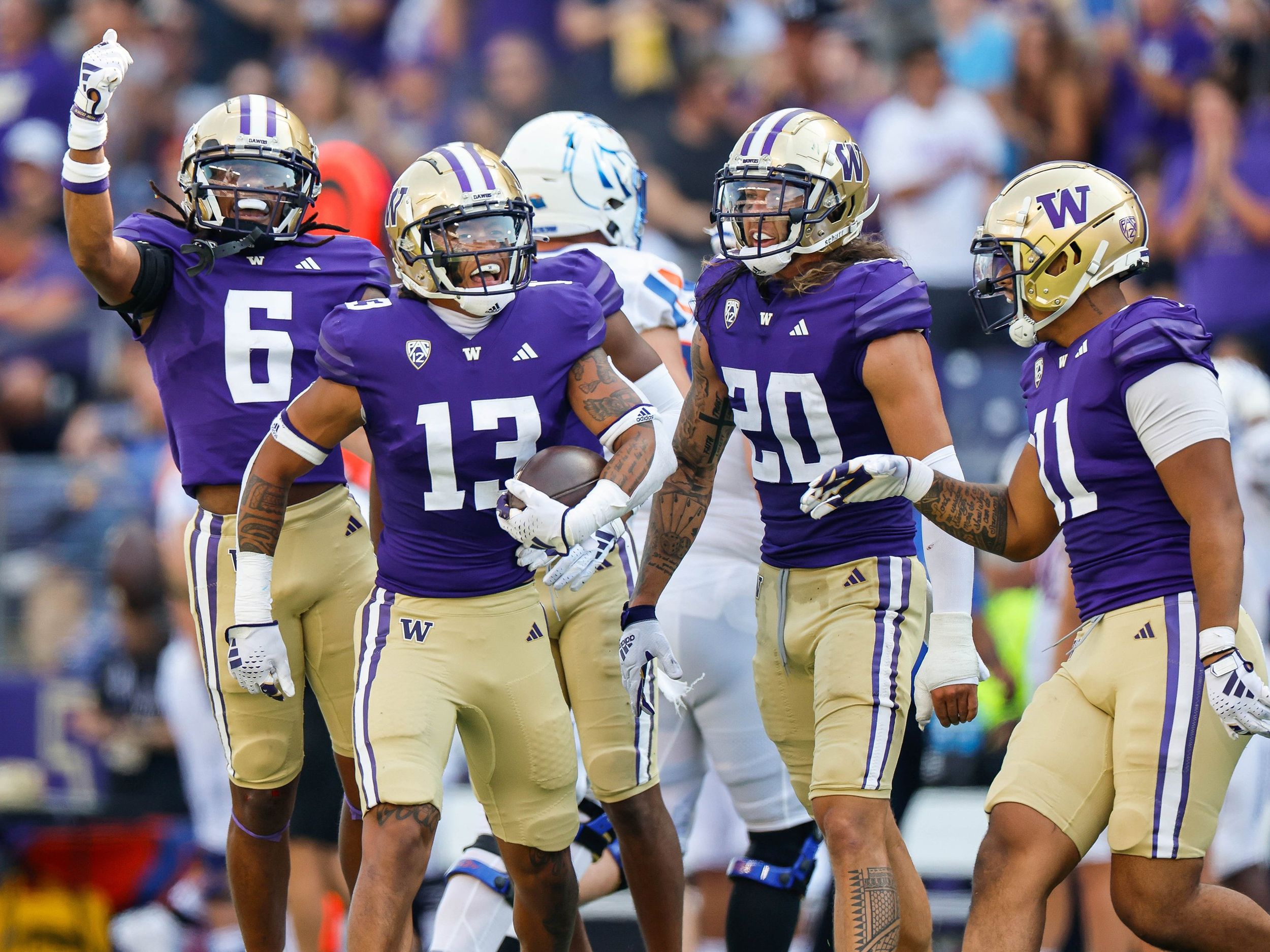 UW Huskies lose center Matteo Mele, cornerback Davon Banks for