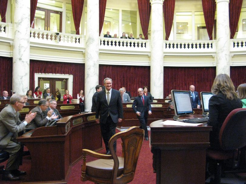 Sens. Mike Crapo and Jim Risch enter the Idaho Senate chamber on Tuesday to address lawmakers (Betsy Russell)