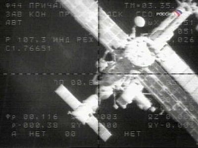 
The international space station is seen from a Russian cargo ship, the unmanned Progress M-53 spacecraft, which makes its slow approach Sunday in this image from television footage provided by Russian Mission Control. The cargo ship successfully docked with the space station Sunday, delivering supplies for its U.S. and Russian crew, Mission Control said. 
 (Associated Press / The Spokesman-Review)