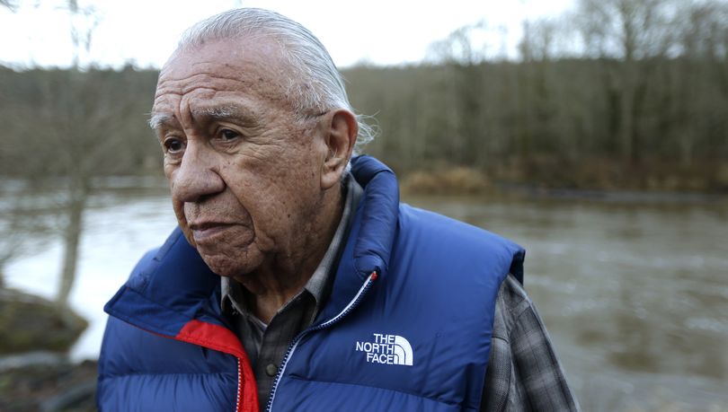 Billy Frank Jr., a Nisqually tribal elder who was arrested dozens of times during the Fish Wars, is seen earlier this year near Frank’s Landing on the Nisqually River. (Associated Press)