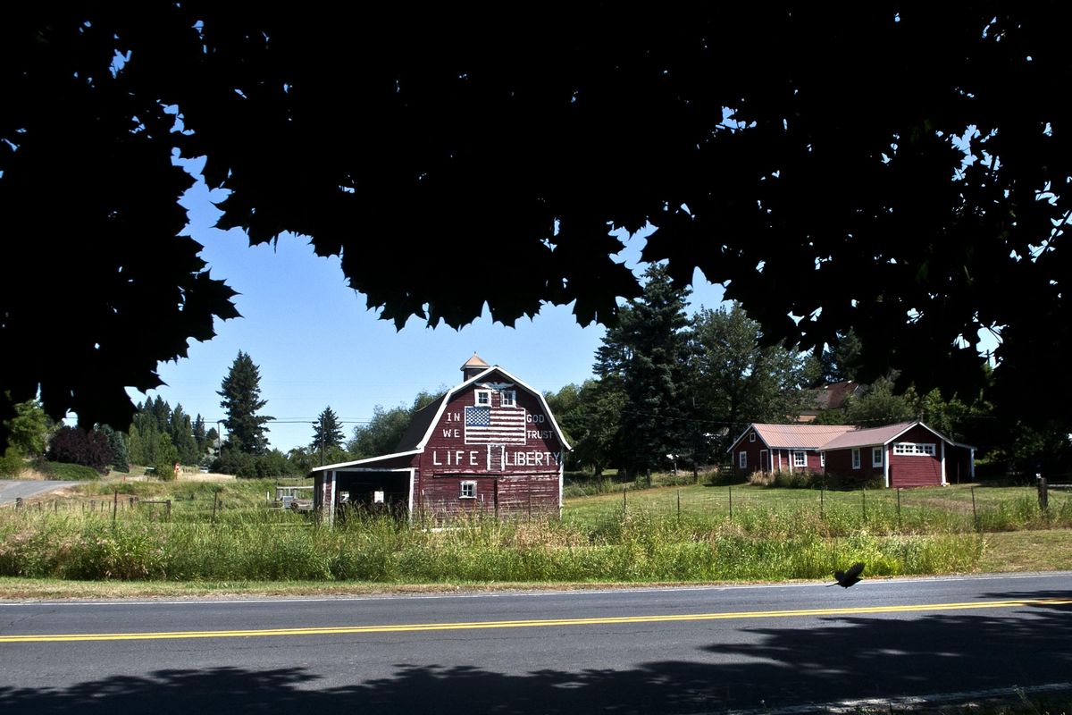 “I painted it for the first time in 1976,” Dave Krell said about the barn on his property in Latah on Wednesday, July 19, 2017. The barn was built in the early 1900s. (Kathy Plonka / The Spokesman-Review)