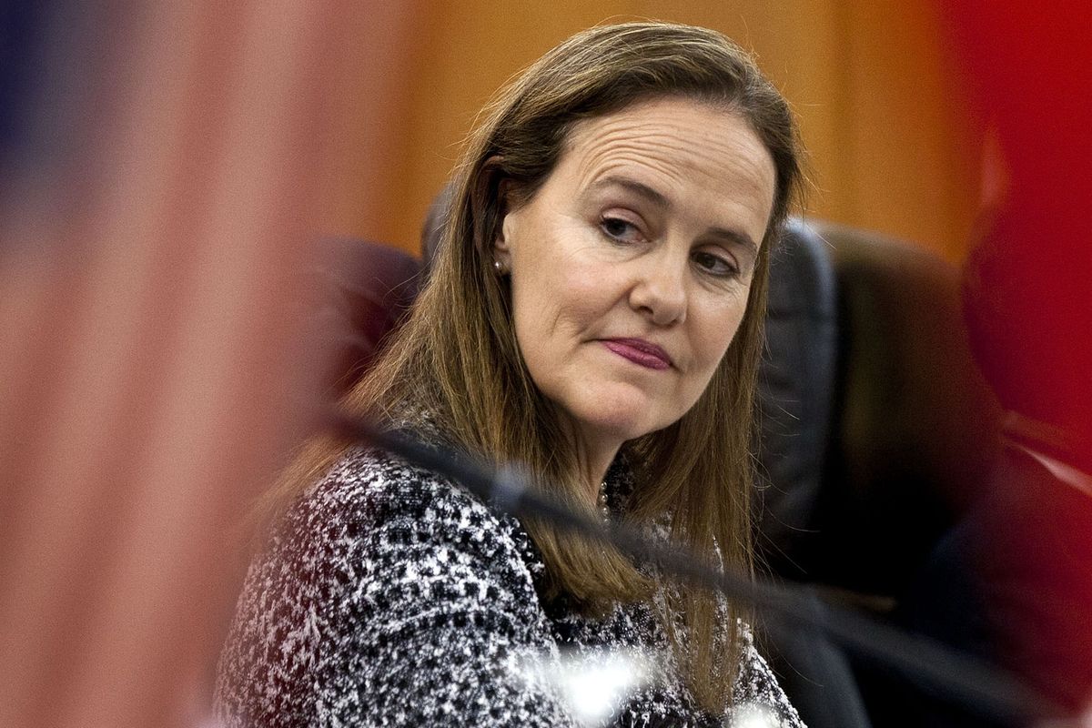 FILE - This Dec. 7, 2011 file photo shows former U.S. Defense Undersecretary Michele Flournoy, preparing for a bilateral meeting in Beijing, China. Flournoy, a politically moderate Pentagon veteran, is regarded by U.S. officials and political insiders as a top choice for President-elect Joe Bide to choose to head the Pentagon.  (Andy Wong)