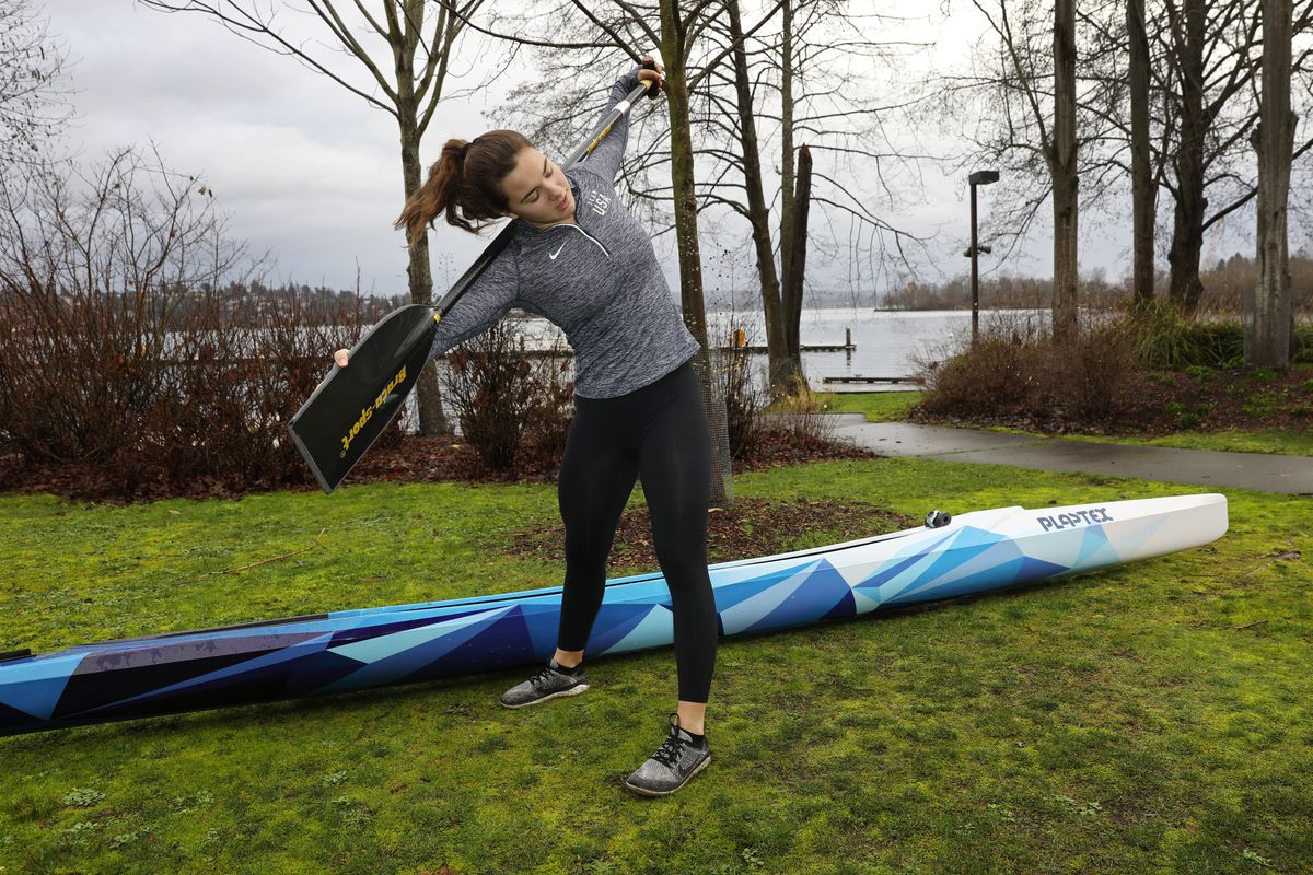 Nevin Harrison, stretching out before launching from the University of Washington, Tuesday, Jan. 28, 2020 in Seattle is a 17-year-old canoeist who has qualified for the 2020 Olympics. 212798 (Ken Lambert/The Seattle Times)