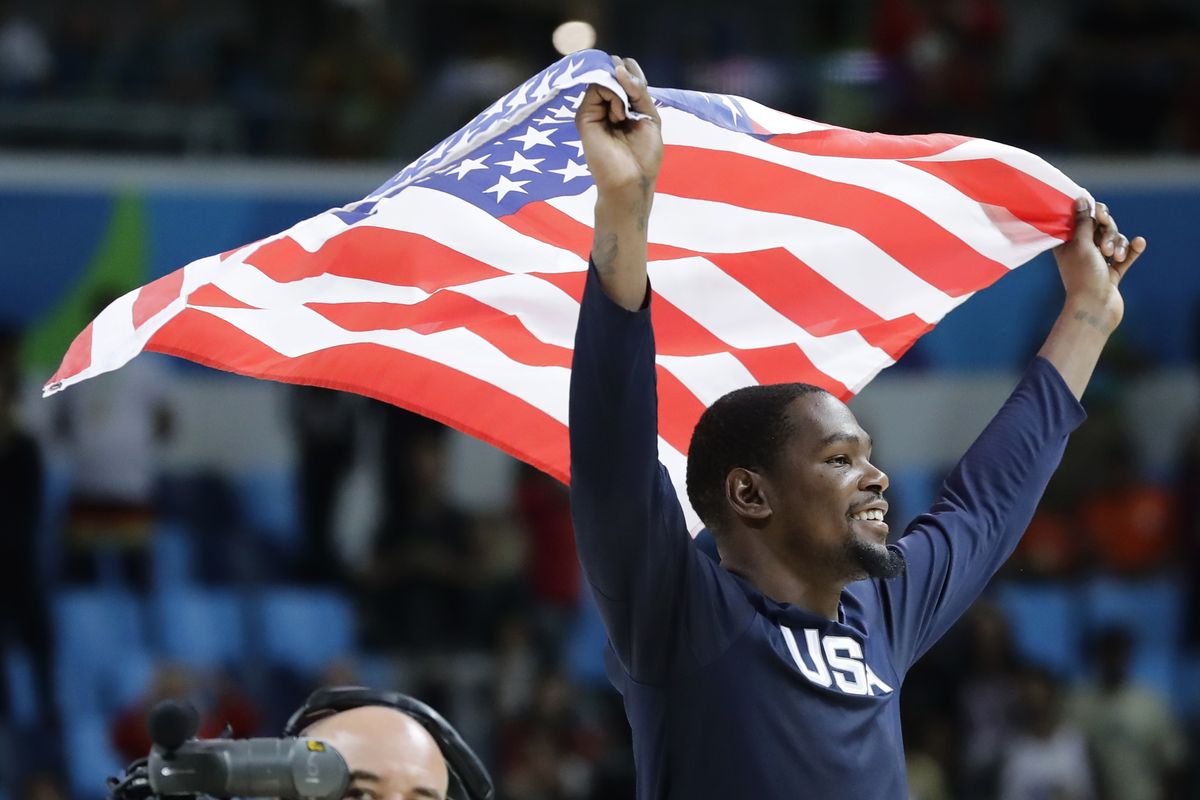 In this Aug. 21, 2016, file photo, United States’ Kevin Durant celebrates after the team won gold in men’s basketball at the Summer Olympics in Rio de Janeiro. Durant and coach Gregg Popovich will lead the U.S. team into the Tokyo Olympics as the Americans try to secure a fourth consecutive gold medal.  (Associated Press)