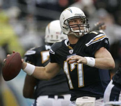 
San Diego Chargers quarterback Philip Rivers, though listed as doubtful, said he is optimistic he will play on Sunday. Associated Press
 (Associated Press / The Spokesman-Review)