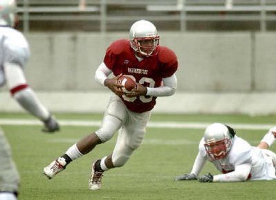 Washington State University's leading receiver, Jason Hill, briefly considered entering the NFL draft before returning to confound defenders in college ball.
(Joe Barrentine / The Spokesman-Review)