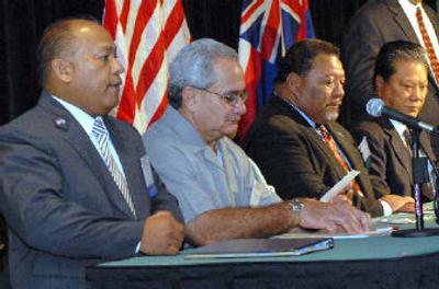 
From left, Tim Villagomez, lieutenant governor of the the Northern Mariana Islands; Togiola Tulafono, governor of American Samoa; Joseph J. Urusemal, president of the Federated States of Micronesia; and Kessai Note, president of the Marshall Islands, listen during a keynote address by U.S Interior Secretary Dirk Kempthorne. 
 (Associated Press / The Spokesman-Review)