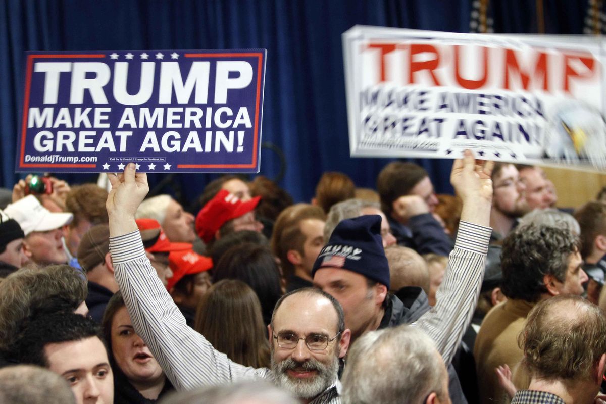Supporters wait for Republican presidential candidate, businessman Donald Trump to speak during a primary night rally, Tuesday, Feb. 9, 2016, in Manchester, N.H. (Bill Sikes / Associated Press)