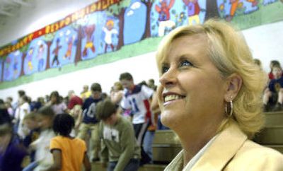 
Hayden artist Linda Fabrizius, a longtime volunteer at Ponderosa Elementary in Post Falls, was honored during an assembly on Thursday. She helped students create a 72-by-8-foot mural, which was recently completed. 
 (Kathy Plonka / The Spokesman-Review)