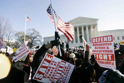 
Protesters gather in front of the Supreme Court in Washington on Monday. 
 (Associated Press / The Spokesman-Review)