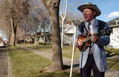
David Butler sings in front of his home in Twin Falls, Idaho. The 17-year-old made his own 
