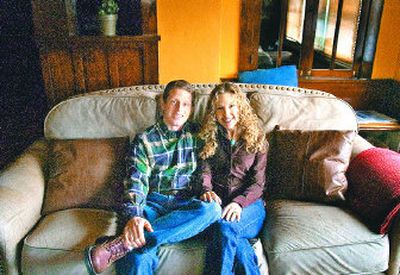 
Charlie and Rebecca Ker relax on the living room couch in their Audubon Park area home.  
 (Christopher Anderson / / The Spokesman-Review)