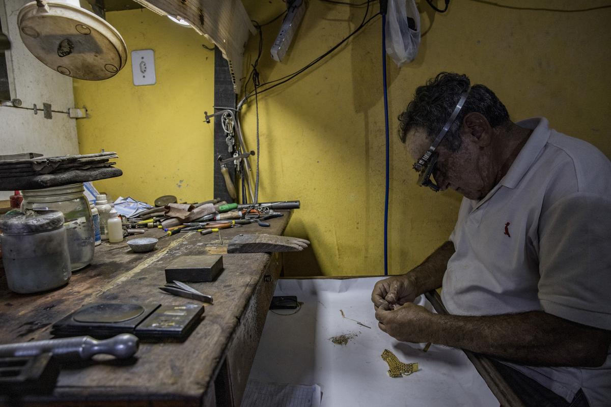 A jeweler that makes gold jewelry from illegal mining in the protected land of the Yanomami people in the Amazon, on May 17, 2022, in Boa Vista, Roraima state, Brazil. Global demand for critical minerals, used to build drones and electric cars, is surging, setting off a new wave of criminality in the world