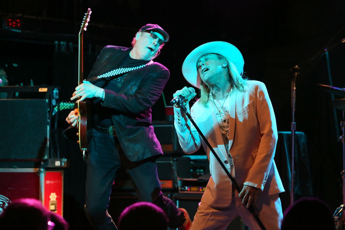 Rick Nielsen and Robin Zander of Cheap Trick perform at Live Nation’s National Concert Day sponsored by Pringles on May 3, 2016, in New York.  (Stuart Ramson/Associated Press)