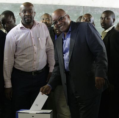 African National Congress president Jacob Zuma, second from right, casts his ballot  in of Kwanxamabala, South Africa, on Wednesday.  (Associated Press / The Spokesman-Review)