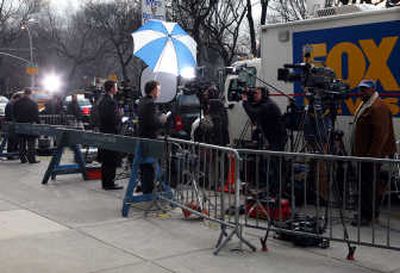 
Members of the media line up outside New York Gov. Eliot Spitzer's Fifth Avenue residence in New York City on Tuesday. Associated Press
 (Associated Press / The Spokesman-Review)