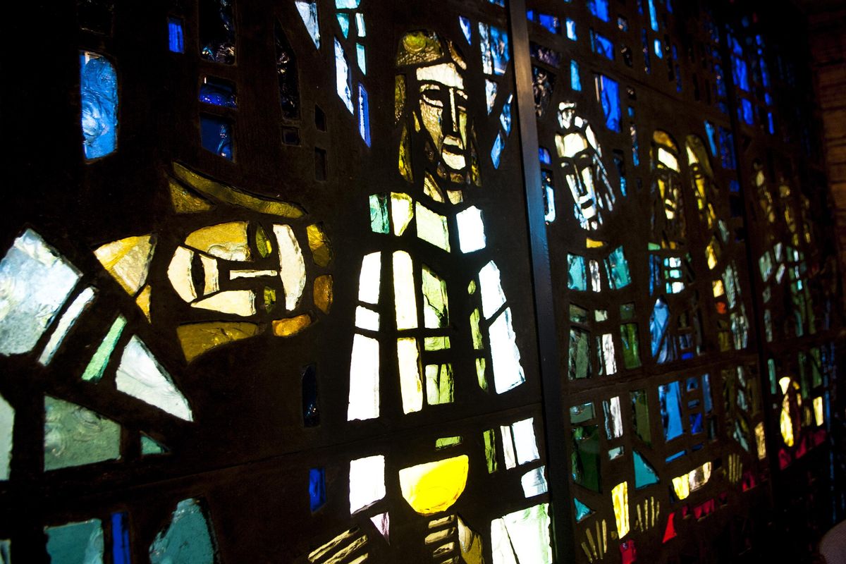 The Last Supper is depicted in modern-art stained glass at St. Charles Catholic Church in Spokane on Friday, March 31, 2017. (Kathy Plonka / The Spokesman-Review)