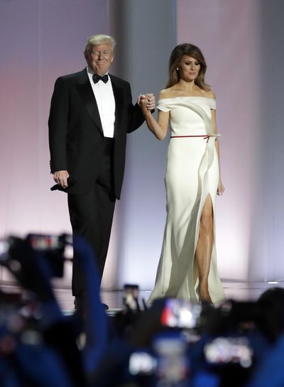 In this Jan. 20, 2017 photo, President Donald Trump arrives with first lady Melania Trump at the Liberty Ball in Washington. Melania Trump is donating her inaugural ball gown to the first ladies collection at the Smithsonian Institution. (Patrick Semansky / Associated Press)