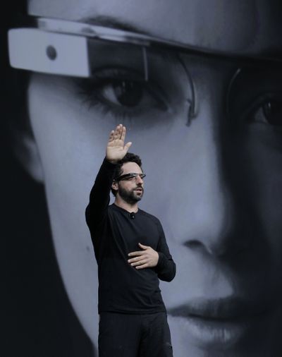 Google co-founder Sergey Brin demonstrates Google’s new wearable Internet glasses at the Google I/O conference in San Francisco on Wednesday. (Associated Press)