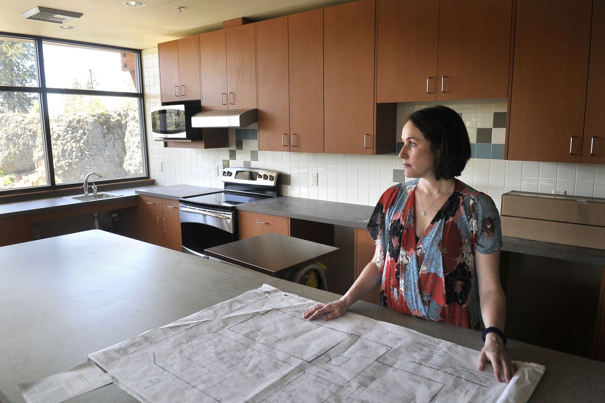 Therapist Krista Crotty stands Thursday in the yet-to-be-finished kitchen area of the Emily Program, an eating-disorder treatment center at 2020 E. 29th Ave. in Spokane. Crotty will manage the program, working alongside other therapists, dietitians and others who specialize in treating people with anorexia, bulimia and other disorders. (Jesse Tinsley)