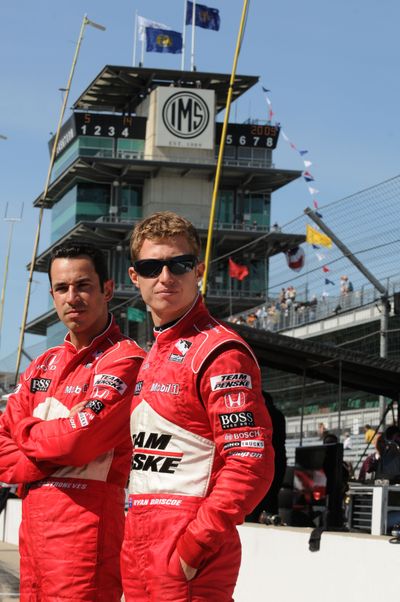 Associated Press IRL teammates Helio Castroneves, left, of Brazil, and Ryan Briscoe, of Australia, have each other’s back. (Associated Press / The Spokesman-Review)