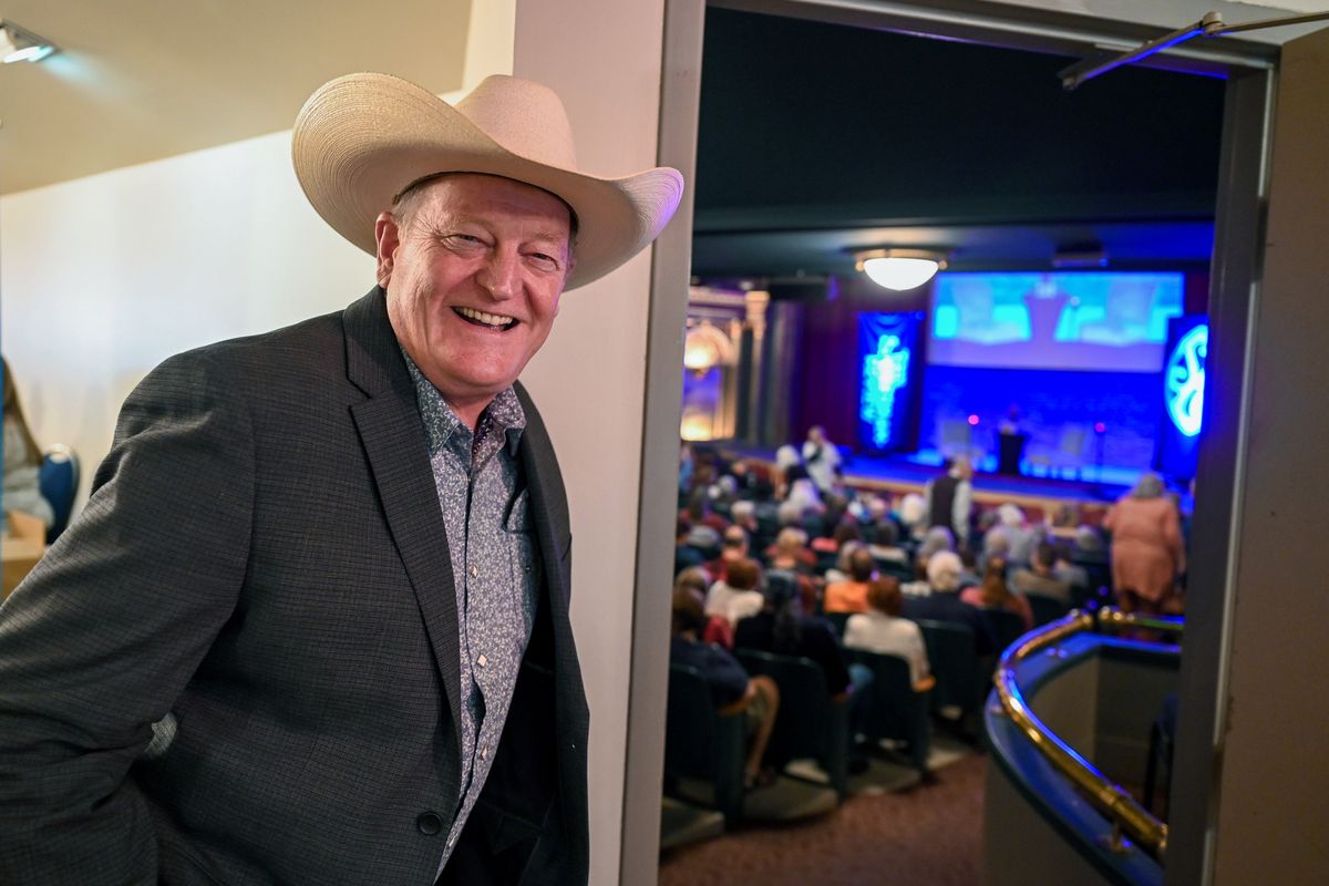 “Longmire” author Craig Johnson pauses inside the Bing Crosby Theater, Sept. 17, 2022. He’ll be back in Spokane on Wednesday to talk about his latest in the Walt Longmire series, “The Longmire Defense.”  (DAN PELLE/THE SPOKESMAN-REVIEW)